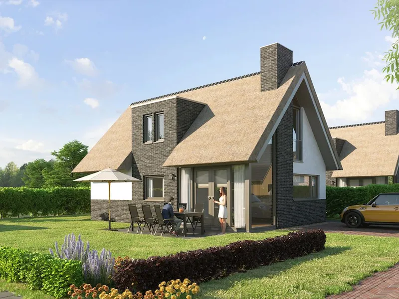 Een luxe, vrijstaande en rietgedekte vakantievilla met een grote tuin en terras op Residence Berger Duinen.