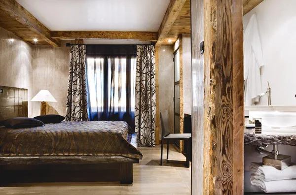 Wintersport kinderen, Hotel CGH Les Suites du Nevada, hotelkamer bed2