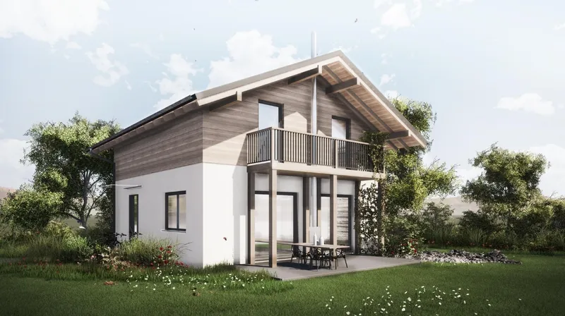 De buitenkant van een moderne, vrijstaande vakantiewoning op Landal Arber in het Beierse Woud, met een houten bovenverdieping, balkon en een terras in de tuin.