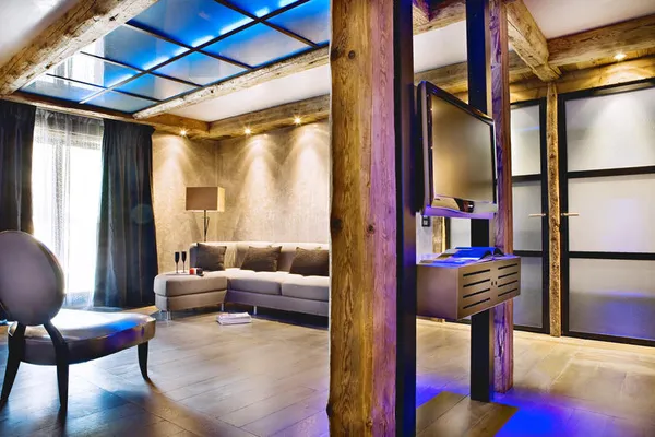 Wintersport kinderen, Hotel CGH Les Suites du Nevada, hotelkamer zithoek2